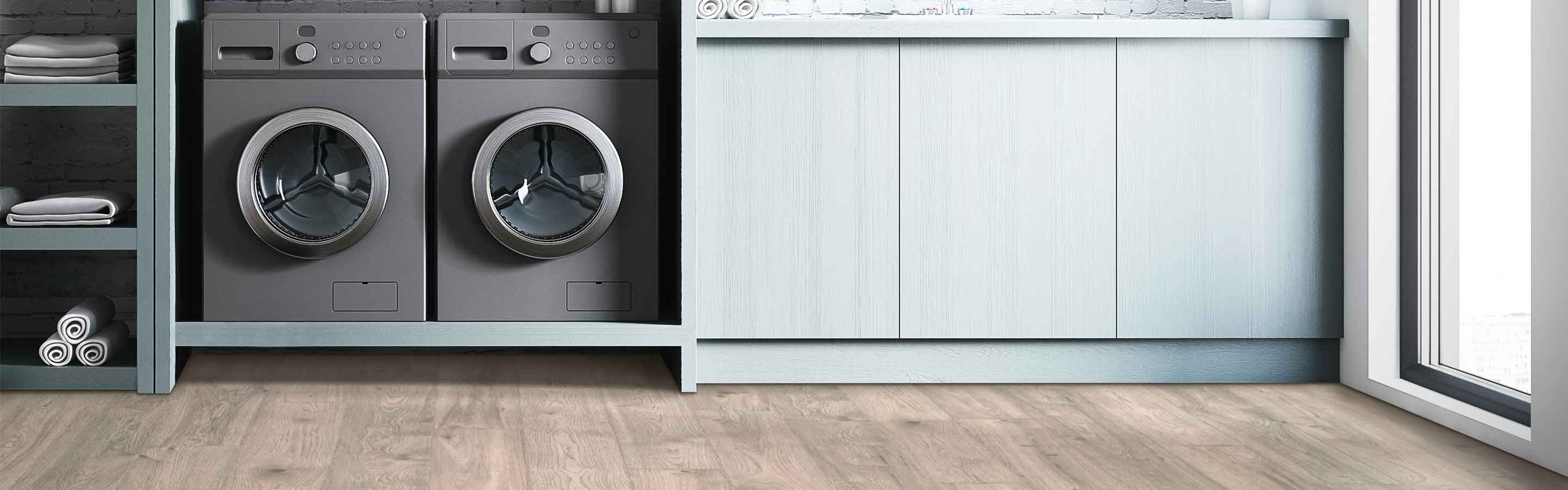 Laminate flooring in a laundry room with built in shelving
